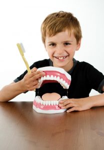 WHAT IS THE RIGHT AGE TO TEACH CHILDREN TO FLOSS?